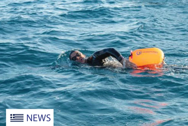 man swimming in the sea